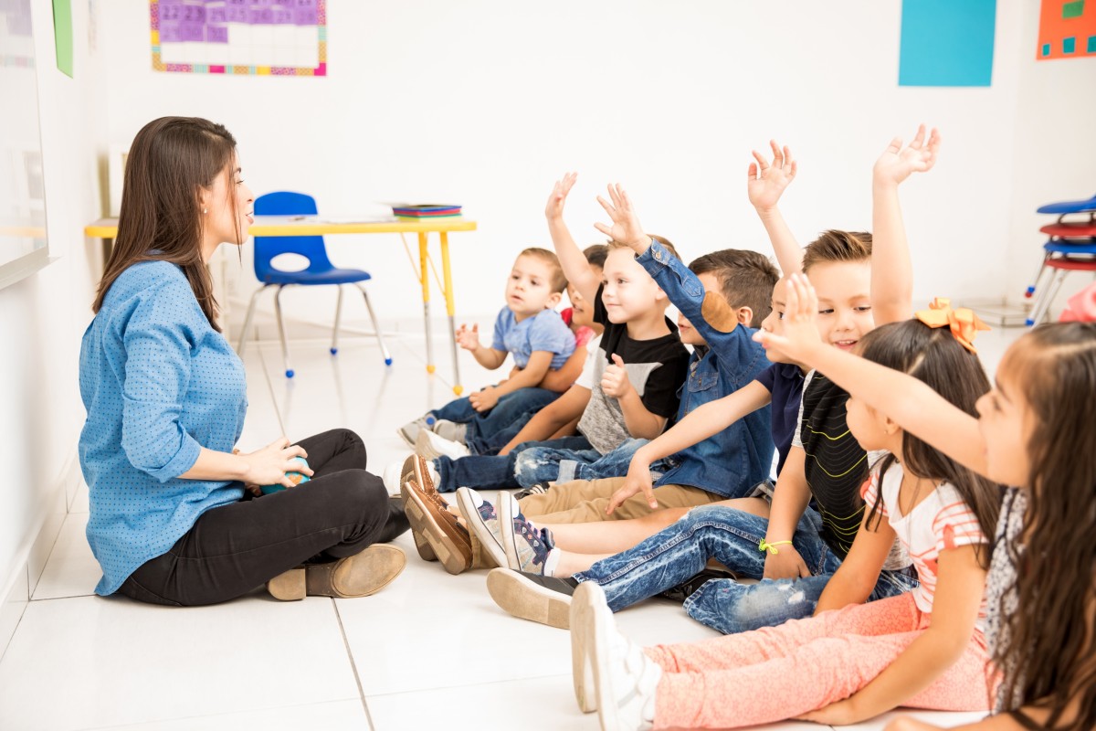 profile-view-group-preschool-students-raising-their-hands-trying-participate-school (2)